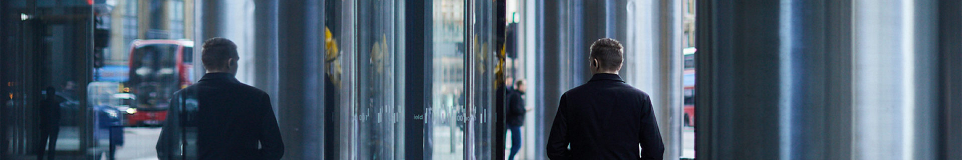 SF Person Walking In Front Of Building In London A1570